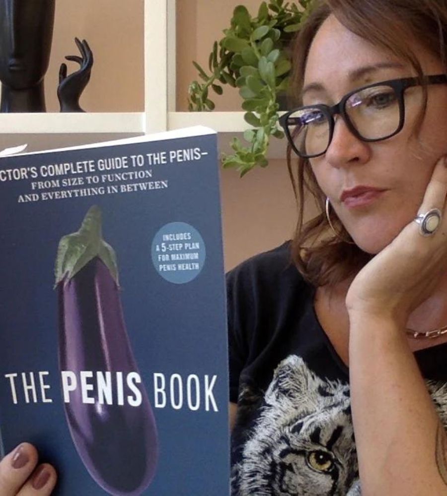 Oceanna Van Lelyveld headshot with The Penis Book